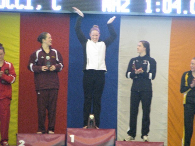 Wisconsin Whitewater's Amy Spaay celebrates her program's first ever NCAA title. (Janna Schulze/SwimSwam.com)