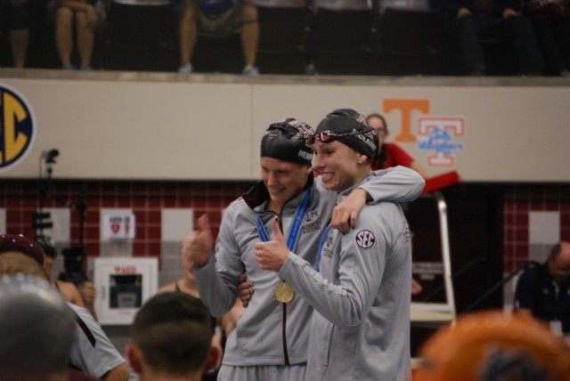 Texas A&M's Sarah Henry (left) and Maureen McLaine took 1st and 3rd in the women's 1650 free. Credit: Janna Schulze