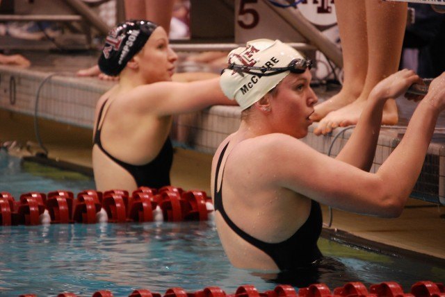 Melanie McClure and Tess Simpson After Heat 5 of the 200 backstroke prelims
