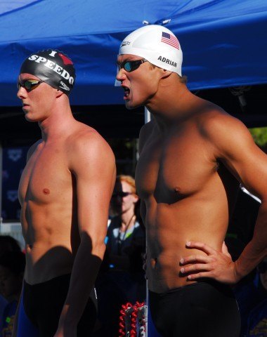 Connor Dwyer (left) matched his lifetime bests in the 100 free final, but Olympic Champion Nathan Adrian poured on the speed coming home for the victory in Santa Clara. (Photo: Bill Collins