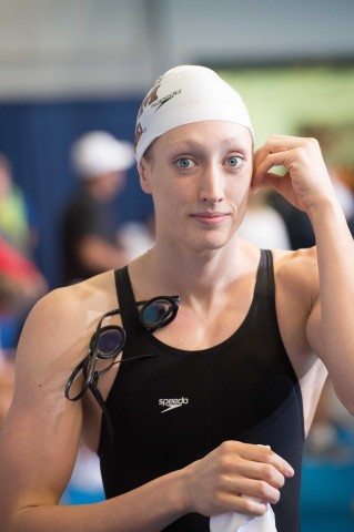 Class act. Breeja Larson heads to the blocks for the 100 breast prelims. (photo: Mike Lewis, Ola Vista Photography)