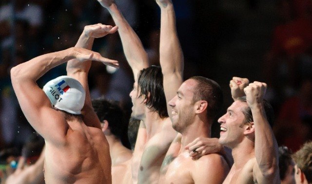 The French Team celebrates the men's 4x100 medley relay victory, 2013 FINA World Championships (Photo Credit: Victor Puig)