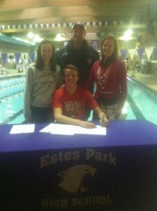 Forrest and the Beesley family at the signing ceremony for the Estes Park High School swimmer. Photo credit: Guy Beesley.