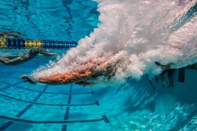 Keep on swimming - competitor hits the water at USMS nationals. (photo: Mike Lewis, Ola Vista Photography)
