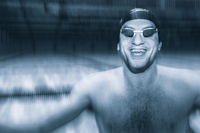 Houchin's got it going on. Beyond training he's the man behind a tech start up that helps summer swim leagues run their meets. (photo: Mike Lewis, Ola Vista Photography)