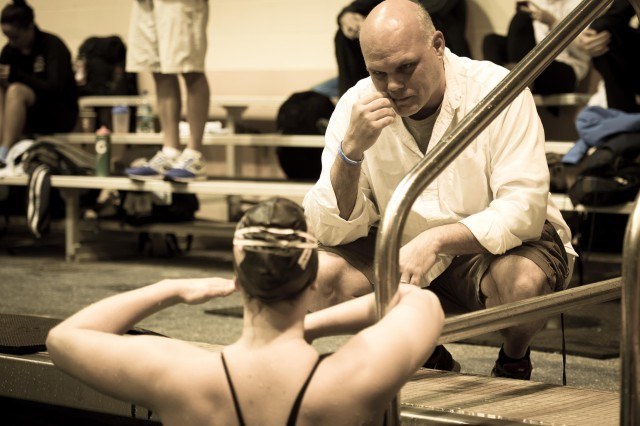 Chloe Sutton (the champ in both the 400 and 800 free) with her coach John Payne