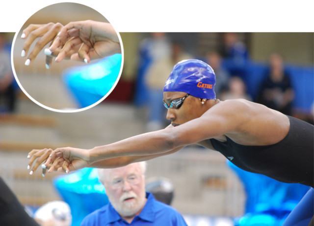 Florida sophomore sprint star Natalie Hinds prepares for a relay start with some fiece-looking white fingernails. (Courtesy: Janna Schulze)