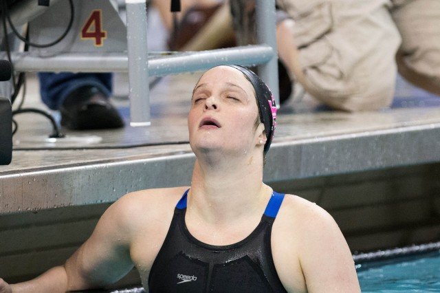 Texas A&M Senior Camille Adams breathes a sigh of relief after winning the 200 fly in her final collegiate race at the 2014 Women's NCAA DI Swimming & Diving Championships (courtesy of Tim Binning, the swim pictures)
