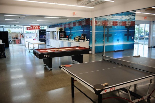 Employees can take a break by shooting pool, playing ping pong or snacking in the state-of-the-art kitchen. TYR Sport Global Headquarters, Seal Beach, CA (courtesy of TYR Sport)