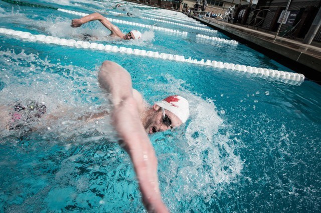 Eric Hedlin (top) and Ryan Cochrane finalizing specific speed work for their distance events. (photo: Mike Lewis, Ola Vista Photography)