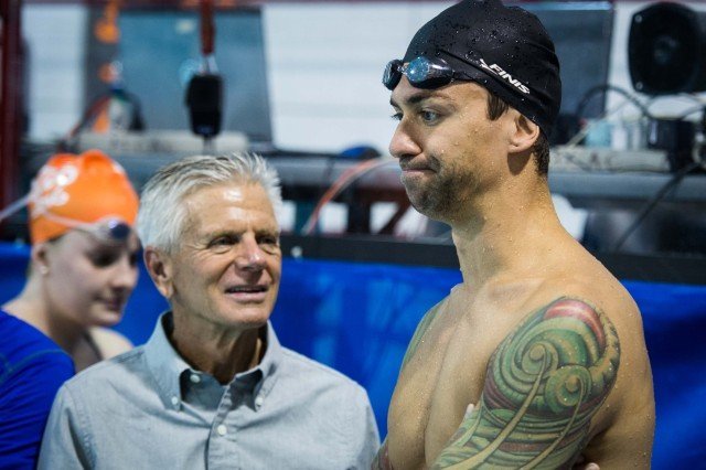 Anthony Ervin gets sage advice from Coach Jack Roach (photo: Mike Lewis, Ola Vista Photography)