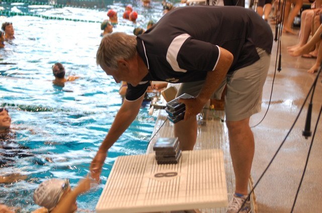 This guy was busy handing out medals for three days. Golden West College head coach Mark Schubert. Photo: Anne Lepesant