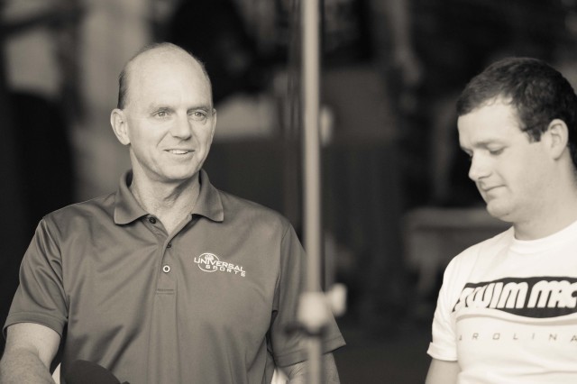 Rowdy Gaines chats it up with Tyler Clary before the start of finals (photo: Mike Lewis, Ola Vista Photography)