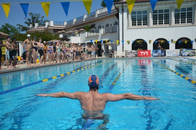 Nick Thoman demonstrates backstroke drills for participants - Fitter and Faster Swim Tour Bethesda, MD Clinic