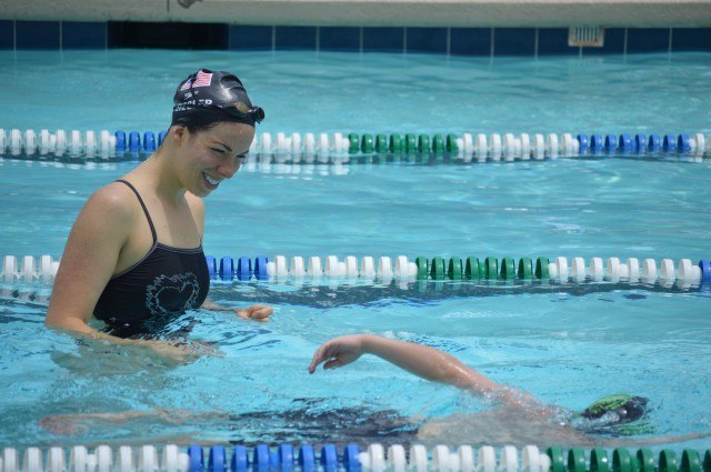 Kate Ziegler watching participants practice freestyle drills - Fitter and Faster Swim Tour Greenville, SC Clinic