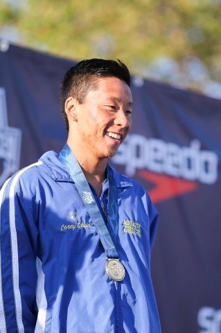 Corey Okubo accepted a well-earned medal from an impressive 200 fly win.