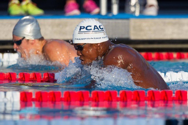 Michael Andrew (background) and Reece Whitley (foreground) battle in the outside lanes of the boys 100 breaststroke B-Final.