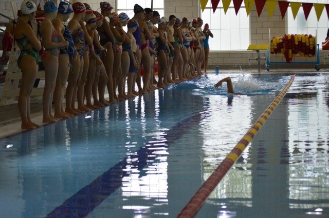 Lacey Nymeyer demonstrating freestyle drills - Fitter and Faster Swim Tour presented by SwimOutlet.com.