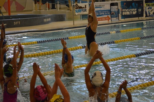 Lacey Nymeyer and particiapnts practice streamline technique - Fitter and Faster Swim Tour presented by SwimOutlet.com.