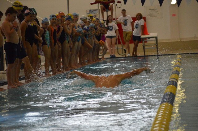 Robert Margalis demonstrating butterfly for participants - Fitter and Faster Swim Tour presented by SwimOutlet.com.