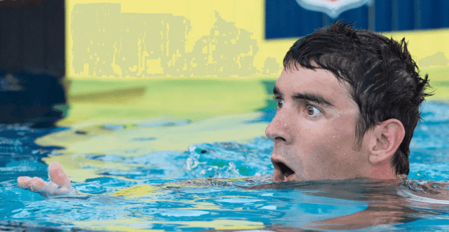 Michael Phelps - Yep, this is your expression at the of end of race, a sprint, where you missed the turn…in a final…at US Nationals. Alas, Phelps will have another shot to swim 100m free in Pan Pac prelims (provide he makes the team this week, which we expect). Image is courtesy of Tim Binning)