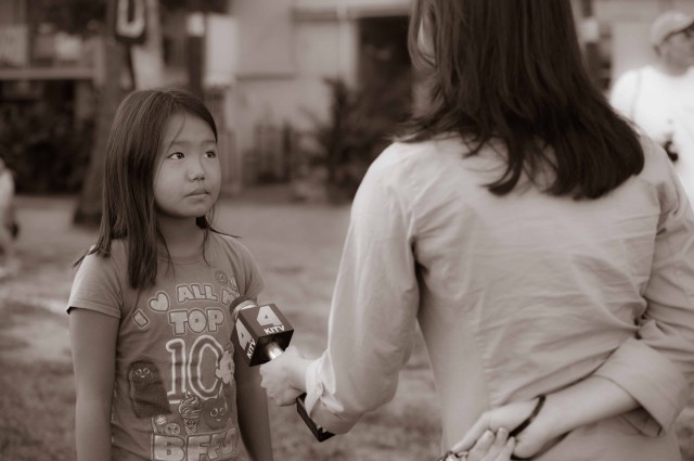 Kayleigh Hanaoka, the youngest swimmer in the race (9) interviewed by local ABC reporter (photo: Mike Lewis, Ola Vista Photography)