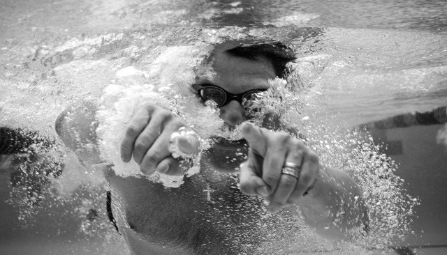 masters swimmer underwater by Mike Lewis