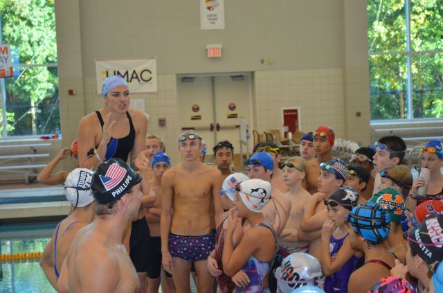 College Park, MD Lacey Nymeyer, Tim Phillips, and Katie Meili explain drills to swimmers - Fitter and Faster Swim Tour presented by SwimOutlet.com