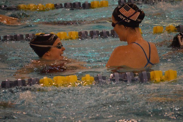 South Bend, IN - Kara Lynn Joyce gives one-on-one feedback - Fitter and Faster Swim Tour presented by SwimOutlet.com