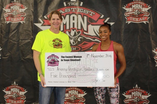 Arianna Vanderpool-Wallace receives her check and the inaugural title of "Fastest Woman in Texas."