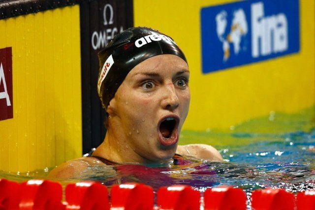 Katinka Hosszu - competes in the 100 back, break the World Record, on day two of the 12th FINA World Swimming Championships (25m) at the Hamad Aquatic Centre on December 3, 2014 in Doha, Qatar (courtesy of FINA)