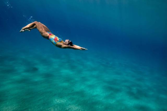 Cynthia Lewis loves to swim. The USMS national record holder shot in Kaua'i Hawaii (photo: Mike Lewis, Ola Vista Photography)