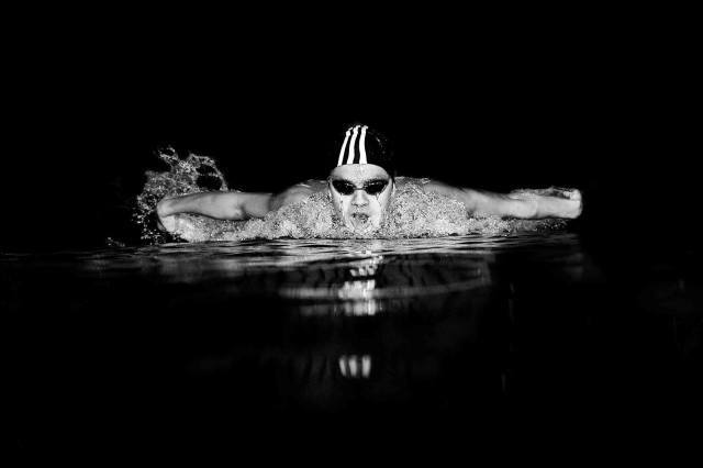 We made this shot of Michael Andrew at Davidson College for P2Life. The facility director was great and turned down the lights so I could focus on exposing with my in water flash. (photo: Mike Lewis, Ola Vista Photography)