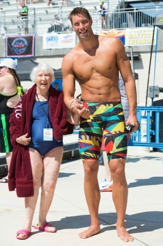 Matt Grever and Anne Dunivin (the oldest woman in the meet 98) shares some time with Olympic Champion Matt Grevers (Photo: Mike Lewis - Courtesy of U.S. Masters Swimming)