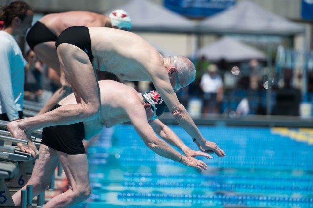Arnold Reardon off the blocks in the 50 free. (Photo: Mike Lewis - Courtesy of U.S. Masters Swimming)