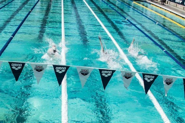 Pelton, Franklin and Bootsma face off in teh prelims of the women's 100 back. (photo: Mike Lewis, Ola Vista Photography)