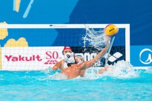 U.S.A. men's water polo team Captain Tony Azevedo returns a teammates pass as the team competes against Italy at the 2015 FINA World Championships held in Kazan, Russia.