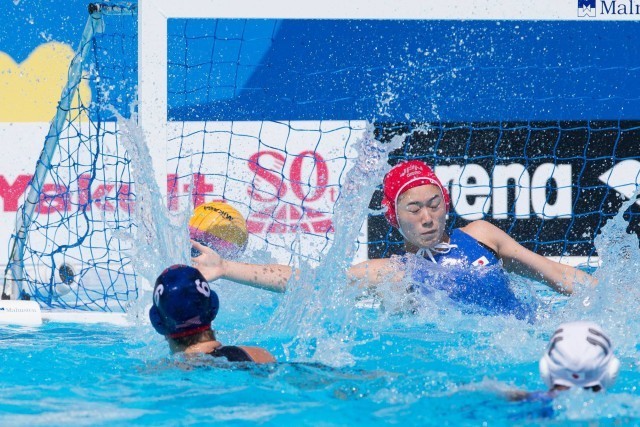 Margaret Steffens of the USA women's water polo team put's her team up 2-0 against the Japanese team in preliminary round action at the 2015 FINA World Championships held in Kazan, Russia. (courtesy of Tim Binning, theswimpictures.com)