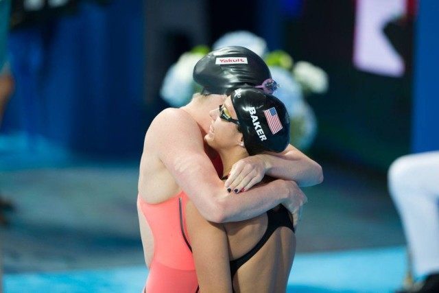 Missy Franklin gives Kathleen Baker a hug at the start of the women's 100 backstoke final on Day 3 of 2015 World Championships. (courtesy of Tim Binning, theswimpictures.com)