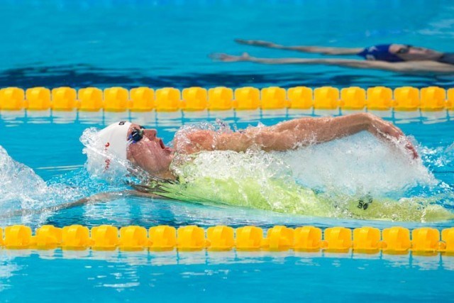 Katinka HOSSU smashing 100m backstroke heat of 58.78, photo courtesy of Tim Binning theswimpictures.com
