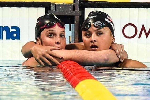 Katie McLaughlin and Cammile Adams following the 200 fly at the 2015 FINA world championships Kazan Russia (photo: Mike Lewis, Ola Vista Photography)