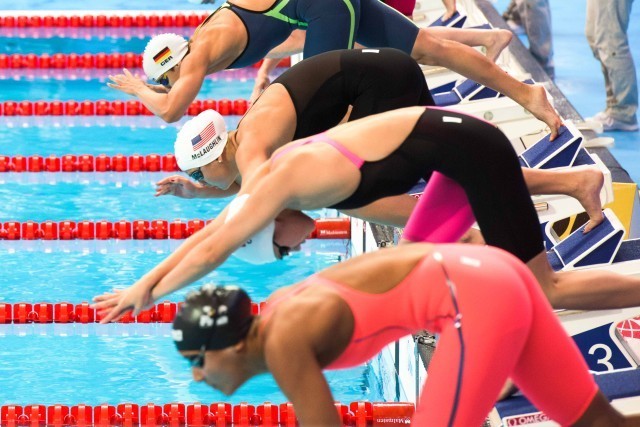 Katie McLaughlin off in the prelims of the 200 fly at the 2015 FINA world championships Kazan Russia (photo: Mike Lewis, Ola Vista Photography)