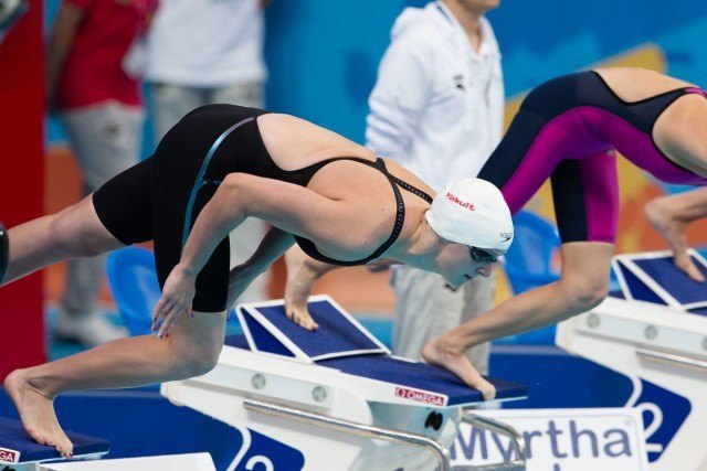 USA's Katie Ledecky dives into a comfortable 800m freestyle heat swim 8:19.42, (courtesy of Tim Binning, theswimpictures.com)