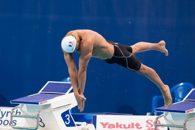 France's Florent Manaudou dives into the mens 50m freestyle prelims 21.71, qualifies fastest for the semi's, courtesy of Tim Binning, theswimpictures.com)