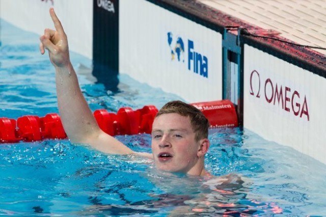 Adam Peaty, GBR, is World Champion in men's 50m breast (26.51) on Day 4 of 2015 World Championships (courtesy of Tim Binning, theswimpictures.com)