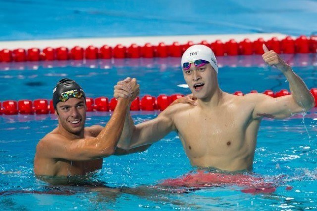Yang Sun, CHN (R) and Gregorio Paltrinieri, ITA (L) after 1-2 finish in men's 800m free on Day 4 of 2015 World Championships. (courtesy of Tim Binning, theswimpictures.com)