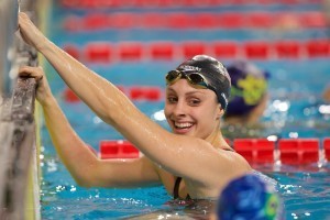 Katie Meili is all smiles after breaking the 100m breaststroke meet record, courtesy of Domeyko Photography