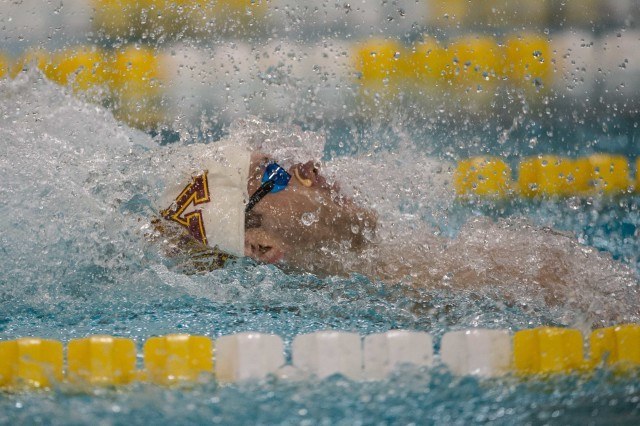 David Plummer under 53 twice in one day - takes the pool record and win in the 100 back (photo: Mike Lewis)