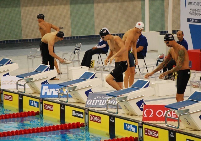 Anthony Ervin and Michael Andrew stepping up to the blocks