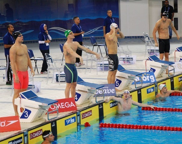 Cameron Van der Burgh, Daniel Gyurta, Michael Andrew preparing to race